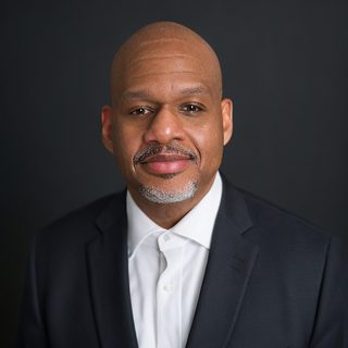 Damon L. Woodard